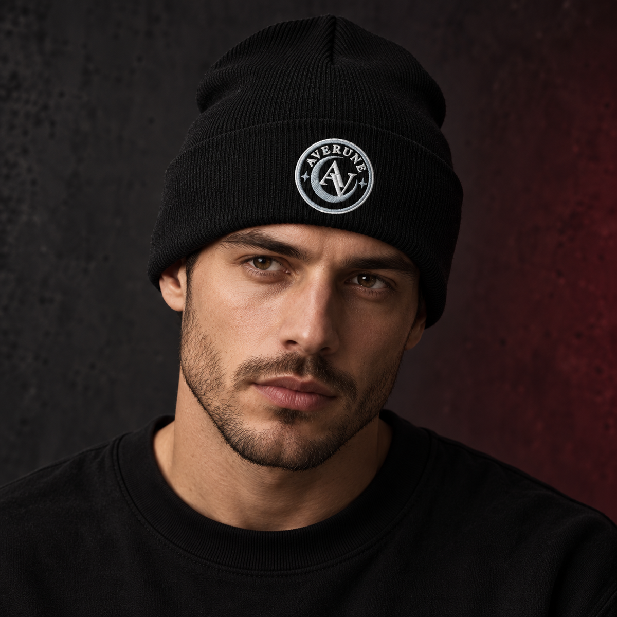 Model wearing the black AVERUNE Signature Embroidered Beanie