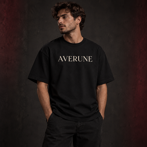 Male model wearing the black AVERUNE Lunar Heavyweight T-Shirt
