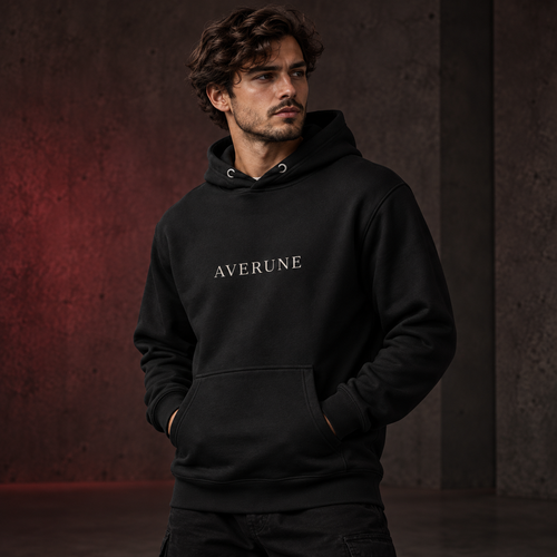 Model wearing the black AVERUNE Lunar Premium Hoodie