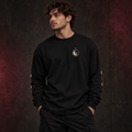 Model wearing the black AVERUNE Orbit Heavyweight Long Sleeve