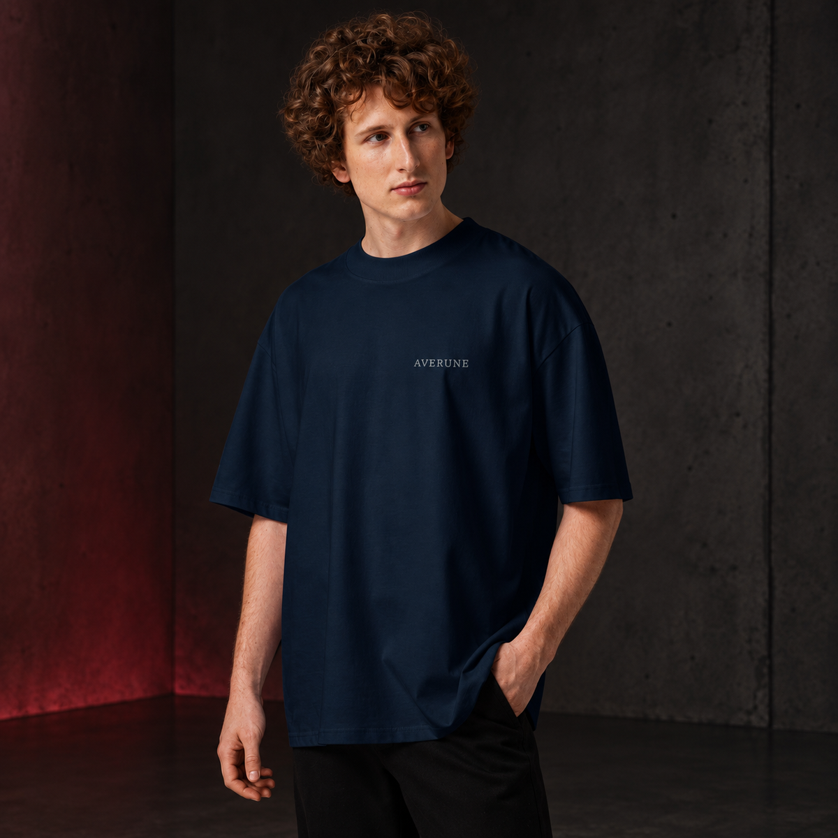 Male model wearing the French navy AVERUNE Organic Oversized T-Shirt